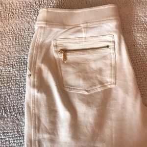 White stretchy pants with rhinestone detail